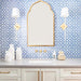 Ivy Blue Victorian Moroccan style 20x20cm patterned tiles, used as a bathroom wall feature behind a vanity with brass fittings and a decorative mirror.