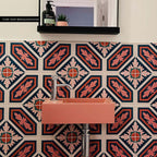 Bathroom interior featuring London Streets Conduit Street 20x20cm Victorian Moroccan style wall tiles, styled with a pink basin sink, chrome tap and black mirror shelf, creating a bold patterned bathroom feature wall.