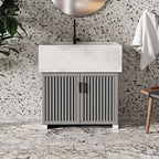 Bathroom interior featuring Fayrouz Picasso 30.5x61cm natural marble tiles with a honed finish, installed on the floor to showcase a white base with bold grey, green and warm gold veining, creating a statement surface with rich natural movement and variation.