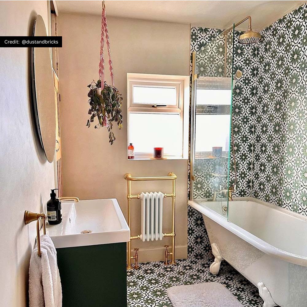 Bathroom featuring Clara Verde Victorian Moroccan-style porcelain tiles in a 20 × 20cm format, used on both the floor and shower walls to create a bold, decorative patterned look.