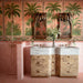 Bathroom featuring Benomar Pink Moroccan Mini Brick Matt 5x15cm wall tiles in a herringbone layout, styled with tropical palm wallpaper, carved wood mirrors, and marble-effect basins for a luxurious eclectic interior.