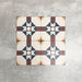 Four London Streets Berlin Street 20x20cm Victorian Moroccan style porcelain tiles arranged together to showcase the repeating geometric star pattern in burgundy, soft blue and cream tones inspired by traditional Victorian style decorative floor tiles.