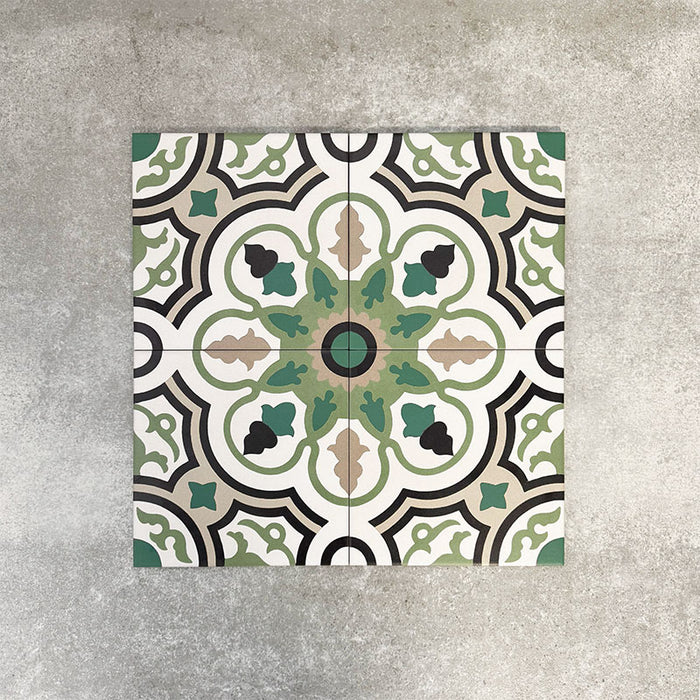 Four London Streets Bond Street 20x20cm Victorian Moroccan style porcelain tiles arranged together to showcase the repeating geometric pattern in green, black and cream tones inspired by traditional Victorian style decorative floor tiles.