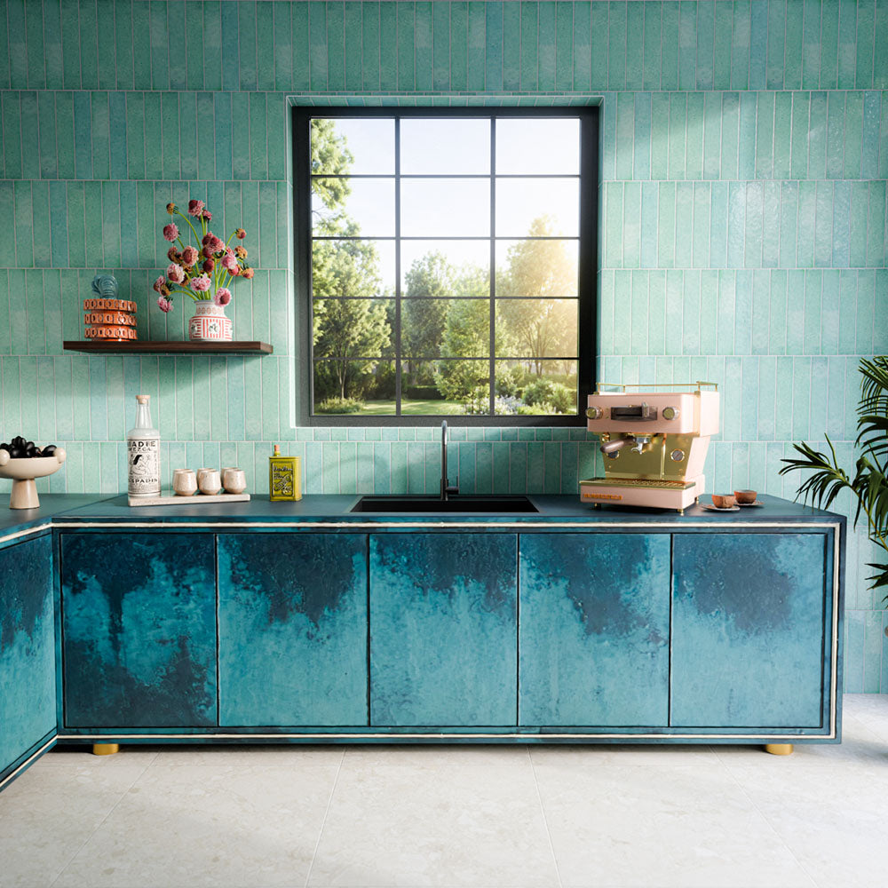 Bora Bora Aqua Brick 6.5cm x 32.8cm wall tiles, featuring a softly varied aqua tone and flux glaze finish, laid vertically to create a fresh, colour-rich kitchen backdrop.