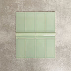 Pimlico Lime Green 7.5 × 15cm ceramic wall tiles with a crackle glaze finish, combined with matching 5 × 15cm dado trim to create a decorative horizontal feature, adding depth and classic detail to wall designs.