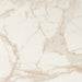 Close-up of Calacatta Oro Complement 60 × 60cm porcelain tile, highlighting a soft white base with delicate gold veining and a refined marble effect, designed to bring light and elegance to contemporary interiors.