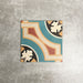Single London Streets Carnegie Hall 20x20cm Victorian Moroccan style porcelain tile displayed in a product setting, featuring an intricate geometric pattern in teal, cream, terracotta and black tones inspired by traditional decorative floor tiles.