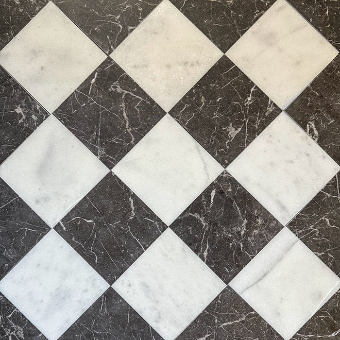 Chequerboard layout featuring Fayrouz White 15.2x15.2cm natural marble tiles with a honed finish, paired with black marble tiles, installed diagonally.
