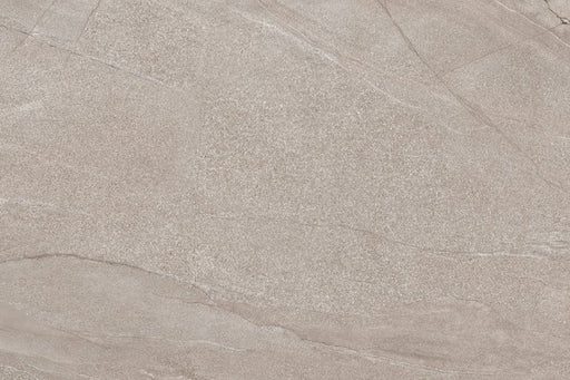Flat lay of Comet Earth Stone 2cm 60 × 90cm porcelain tile, highlighting soft beige stone effect tones with delicate veining and fine surface texture. Subtle variation creates a calm, natural look suited to both indoor and outdoor spaces.