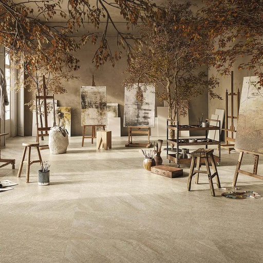 Studio space featuring Comet Earth Stone 2cm 60 × 90cm porcelain tiles, showcasing warm beige and taupe stone effect tones with subtle variation. Creates a soft, natural backdrop suited to calm, contemporary interiors and outdoor spaces.