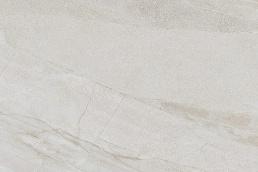 Comet Light Stone 2cm 60 × 90cm porcelain tile featuring a soft beige stone effect with subtle veining and natural tonal variation. Designed for outdoor use, offering a clean, calm finish for contemporary exterior spaces.