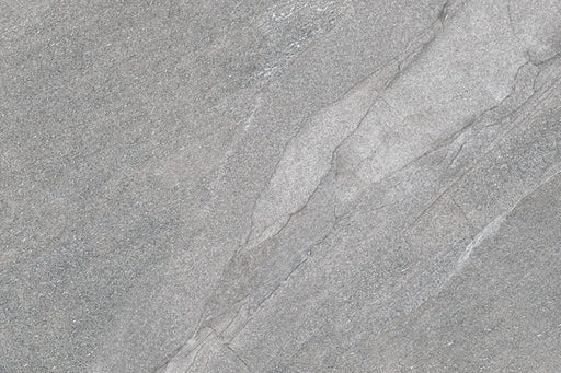 Flat lay of Comet Silver Stone 2cm 60 × 90cm porcelain tile, highlighting cool silver-grey stone effect tones with soft, natural veining and fine surface texture. Subtle variation creates a refined, contemporary finish suitable for both indoor and outdoor spaces.
