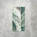 Product display of Crete Fluted Jade Matt 11.5x23cm wall tiles in green marble-effect tones, featuring fluted detailing with layered natural veining against a textured concrete-style backdrop.