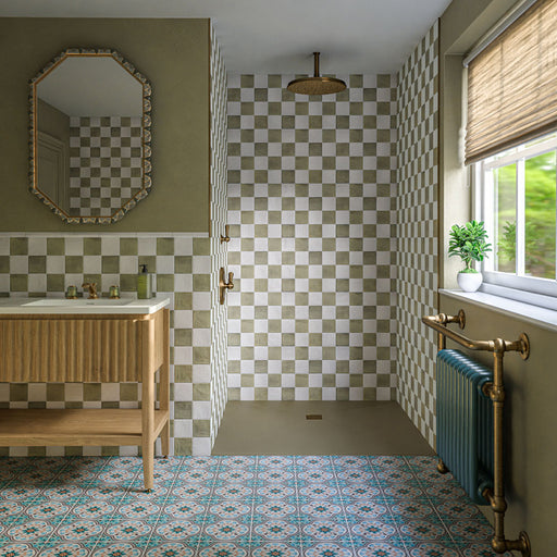 Cuba Bayamo 20cm x 20cm Moroccan style tiles, featuring an intricate blue and terracotta pattern that brings character to the floor, paired with a soft green and white chequerboard wall scheme.