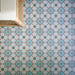 Cuba Bayamo 20cm x 20cm Moroccan style tiles, showcasing an intricate floral-inspired pattern in soft blue, turquoise and warm terracotta tones.