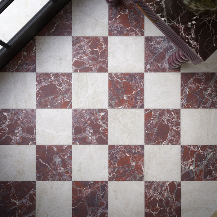 Divine Levant Rouge Matt 30cm x 30cm marble effect floor tiles, creating a bold burgundy and white chequerboard pattern with detailed veining for a richly layered, statement finish.