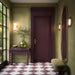 Divine Taj Mahal Matt 30cm x 30cm marble effect floor tiles, paired with burgundy marble effect tiles to create an elegant chequerboard hallway floor, complemented by olive green walls and brass details.