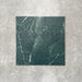 Close-up of Divine Verde Green matt marble-effect tile in a 30cm x 30cm format, featuring rich green tones with elegant white veining and natural marble-inspired movement. The bold stone effect creates a luxurious, timeless finish, making it ideal for statement chequerboard floors, feature areas and sophisticated interior schemes.