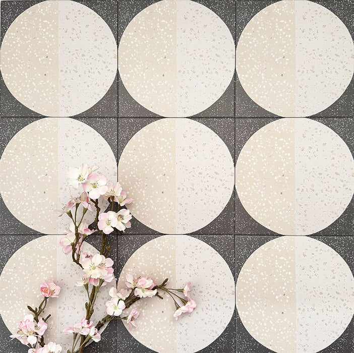 Eclipse Lunar 20x20cm terrazzo-style patterned tiles featuring circular geometric detailing with speckled stone-inspired texture, designed to create bold statement walls and contemporary patterned floor interiors.