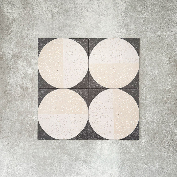 Eclipse Lunar 20x20cm terrazzo-style patterned tiles featuring circular geometric detailing with speckled stone-inspired texture, designed to create bold statement walls and contemporary patterned floor interiors.