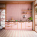 Interior featuring Eclipse Rosa terrazzo effect patterned tiles, combining soft blush pink and warm neutral tones in a striking circular geometric design. Paired with pink cabinetry, natural wood accents and delicate Japanese-inspired styling, this space creates a playful yet sophisticated look that feels bright, contemporary and full of personality. The repeating pattern adds movement and visual interest while maintaining a soft, elegant colour palette.