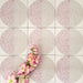 Eclipse Rosa 20x20cm terrazzo-style decor tiles featuring a soft geometric circle design in blush pink and warm neutral tones, creating a playful yet contemporary patterned floor or wall finish.