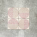 Eclipse Rosa 20x20cm terrazzo-style decor tiles featuring a soft geometric circle design in blush pink and warm neutral tones, creating a playful yet contemporary patterned floor or wall finish.