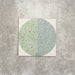 Eclipse Salvia 20x20cm terrazzo-style decor tiles featuring a soft sage and pale blue circular pattern, designed to bring a playful yet calming geometric look to contemporary interiors.