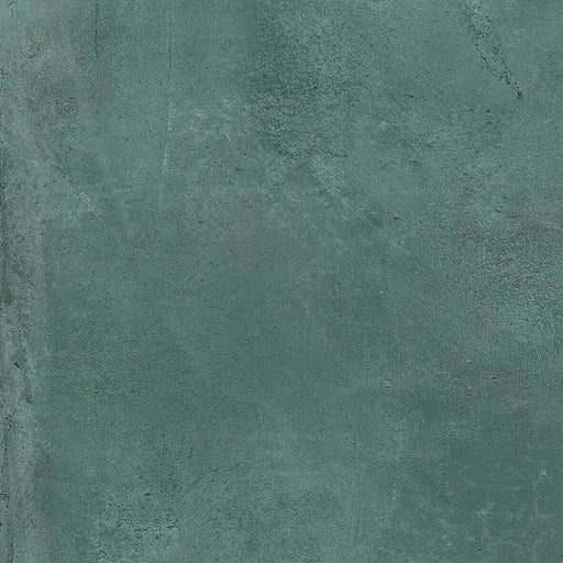 Close-up of Iron Emerald Green Oxide Metallic 60 × 60cm porcelain tile, highlighting rich green tones with subtle tonal variation, a softly textured surface, and a refined metallic effect that adds depth and character to contemporary interiors.