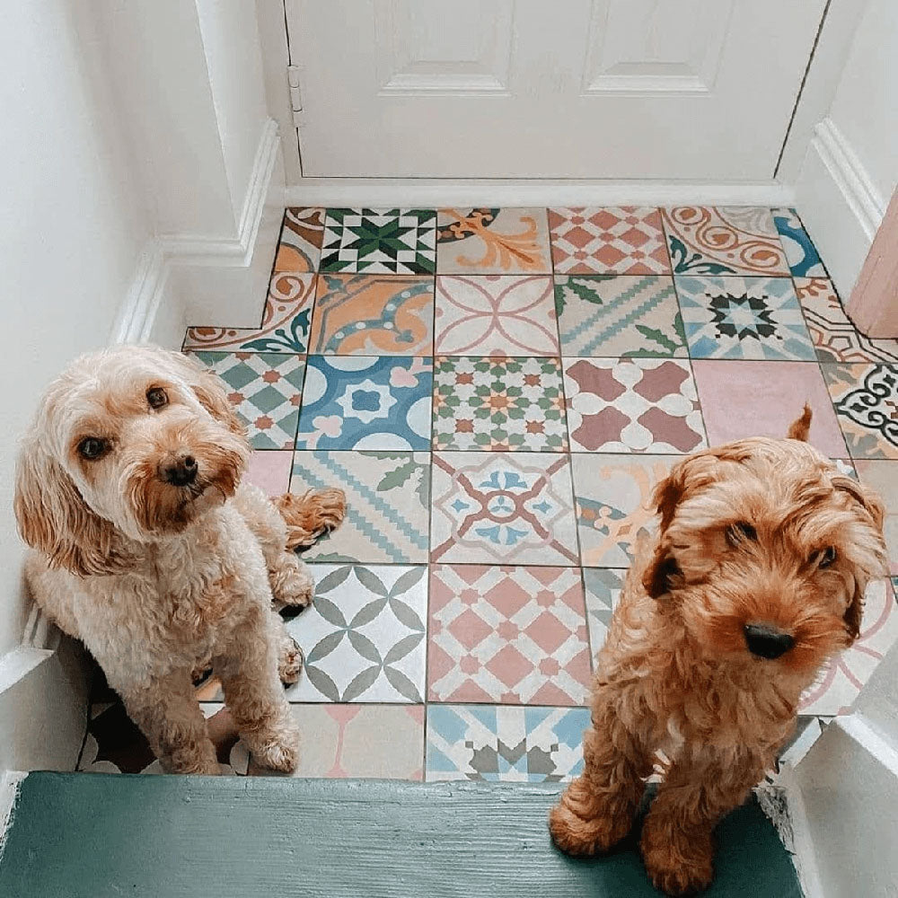 Entrance hallway featuring Fayrouz Patchwork 20×20cm Moroccan-style porcelain floor tiles, displaying a colourful mix of geometric and floral patterns that create a playful, decorative patchwork effect.
