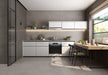 Kitchen interior featuring Etna Grey Matt 30 × 60cm porcelain wall and floor tiles, styled with white cabinetry, warm wood accents, open shelving, and natural light for a modern, balanced, contemporary space.