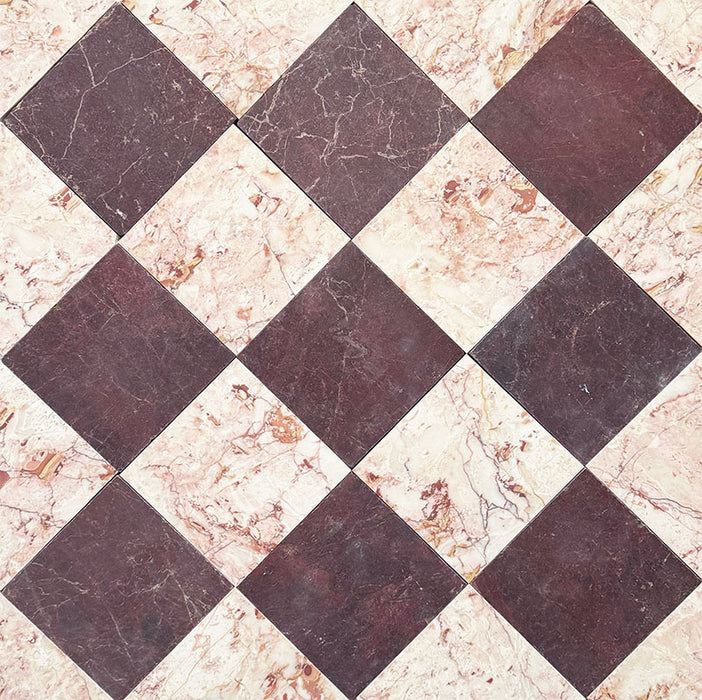 ayrouz Burgundy Red Tumbled Finish natural marble 15.2cm x 15.2cm tiles laid in a diagonal chequerboard pattern with Fayrouz Sylvester Pink marble, highlighting rich natural veining, tonal variation and timeless character.