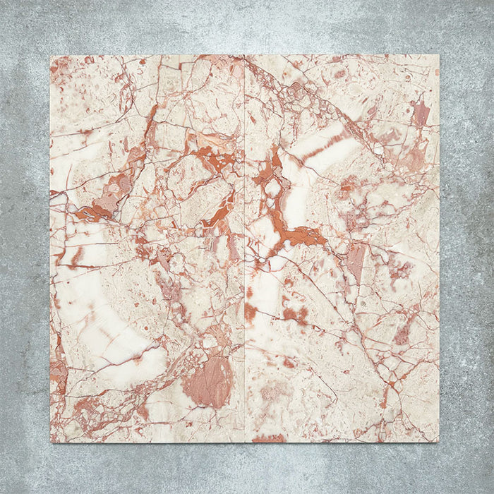 Group of two Fayrouz Sylvester Pink honed natural marble tiles in a 30.5cm x 61cm format, showcasing natural variation with soft blush pink, cream and warm terracotta veining for a luxurious, timeless natural stone finish.