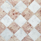 Fayrouz White Tumbled Finish natural marble 15.2cm x 15.2cm tiles laid in a diagonal chequerboard pattern with Fayrouz Sylvester Pink marble, showcasing natural veining, tonal variation and timeless character.