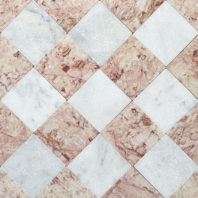 Fayrouz White Tumbled Finish natural marble 15.2cm x 15.2cm tiles laid in a diagonal chequerboard pattern with Fayrouz Sylvester Pink marble, showcasing natural veining, tonal variation and timeless character.