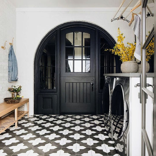 Utility room featuring Almeria Cathedral Moroccan-style porcelain floor tiles in a black and white geometric pattern, 20x20cm, creating a striking and practical tiled floor.