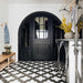 Utility room featuring Almeria Cathedral Moroccan-style porcelain floor tiles in a black and white geometric pattern, 20x20cm, creating a striking and practical tiled floor.