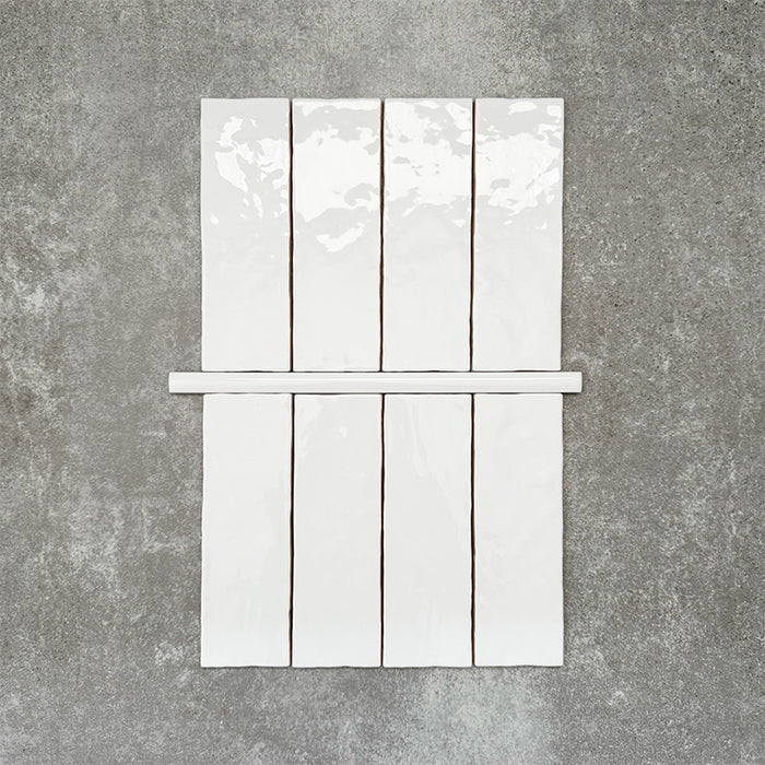 Foundry Arctic White 1.5x30cm gloss pencil bullnose border tile featuring a handcrafted-style finish with soft tonal variation, designed to complement contemporary wall tile layouts and decorative edging details.