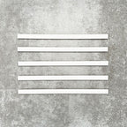 Foundry Arctic White 1.5x30cm gloss pencil bullnose border tiles with a handcrafted-style finish and soft white glaze, designed for decorative edging, borders, and finishing details in contemporary wall tile installations.