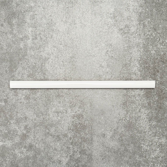 Foundry Arctic White 1.5x30cm gloss pencil bullnose border tile with a handcrafted-style finish and soft white glaze, designed for decorative edging, borders, and finishing details in contemporary wall tile installations.