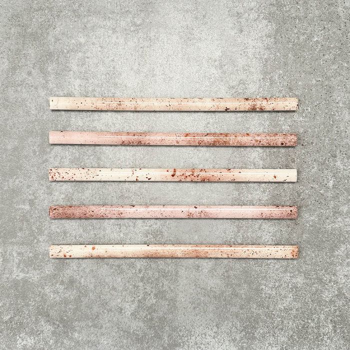 Foundry Coral Pink 1.5x30cm gloss pencil bullnose border tile featuring a handcrafted-style finish with warm blush and terracotta tones, designed for decorative edging and refined finishing details in wall tile installations.