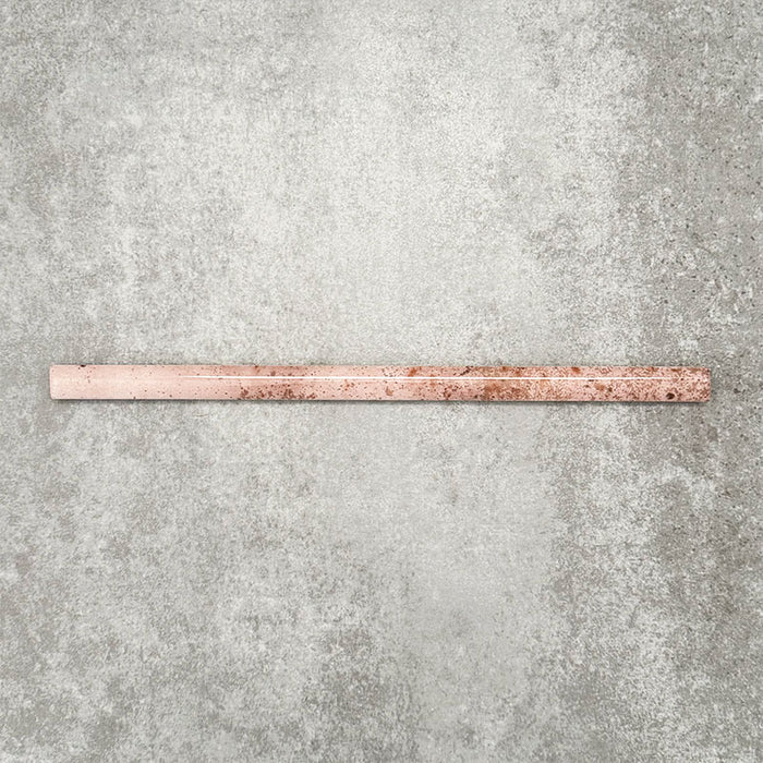 Foundry Coral Pink 1.5x30cm gloss pencil bullnose border tile featuring a handcrafted-style finish with warm blush and terracotta tones, designed for decorative edging and refined finishing details in wall tile installations.