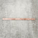 Foundry Coral Pink 1.5x30cm gloss pencil bullnose border tile featuring a handcrafted-style finish with warm blush and terracotta tones, designed for decorative edging and refined finishing details in wall tile installations.