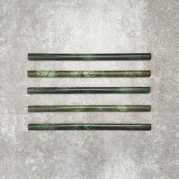 Foundry Jade Green 1.5x30cm gloss pencil bullnose border tile featuring a handcrafted-style finish with rich green tonal variation, designed for decorative edging and refined finishing details in contemporary wall tile installations.
