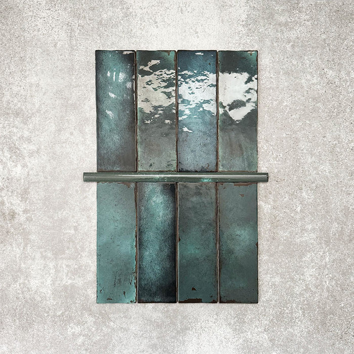 Foundry Marine Blue 1.5x30cm pencil bullnose border tile featuring a handcrafted-style finish with deep blue and teal tonal variation, designed for decorative edging and finishing details in contemporary wall tile installations.
