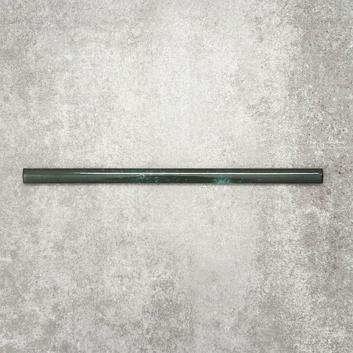 Foundry Marine Blue 1.5x30cm pencil bullnose border tile featuring a handcrafted-style finish with deep blue and teal tonal variation, designed for decorative edging and finishing details in contemporary wall tile installations.