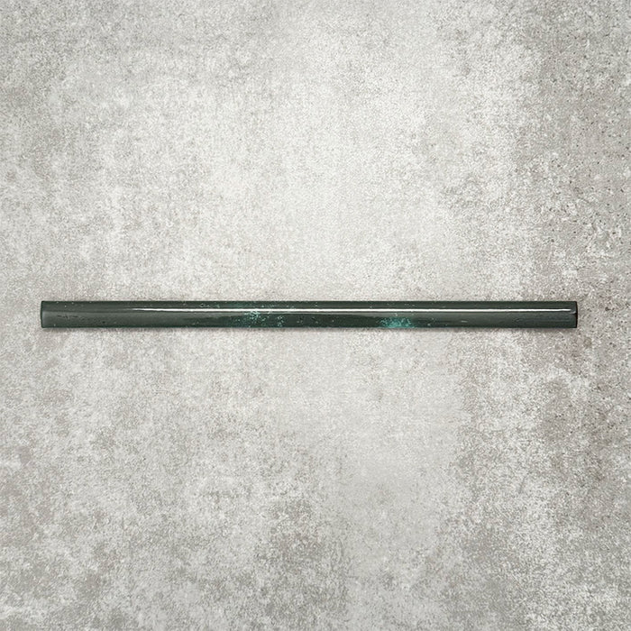 Foundry Marine Blue 1.5x30cm pencil bullnose border tile featuring a handcrafted-style finish with deep blue and teal tonal variation, designed for decorative edging and finishing details in contemporary wall tile installations.