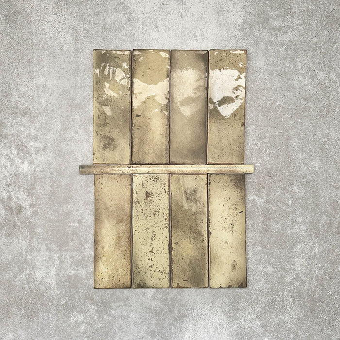 Foundry Moss Green 1.5x30cm gloss pencil bullnose border tile featuring a handcrafted-style finish with earthy olive and stone-toned variation, designed for decorative edging and refined finishing details in wall tile installations.