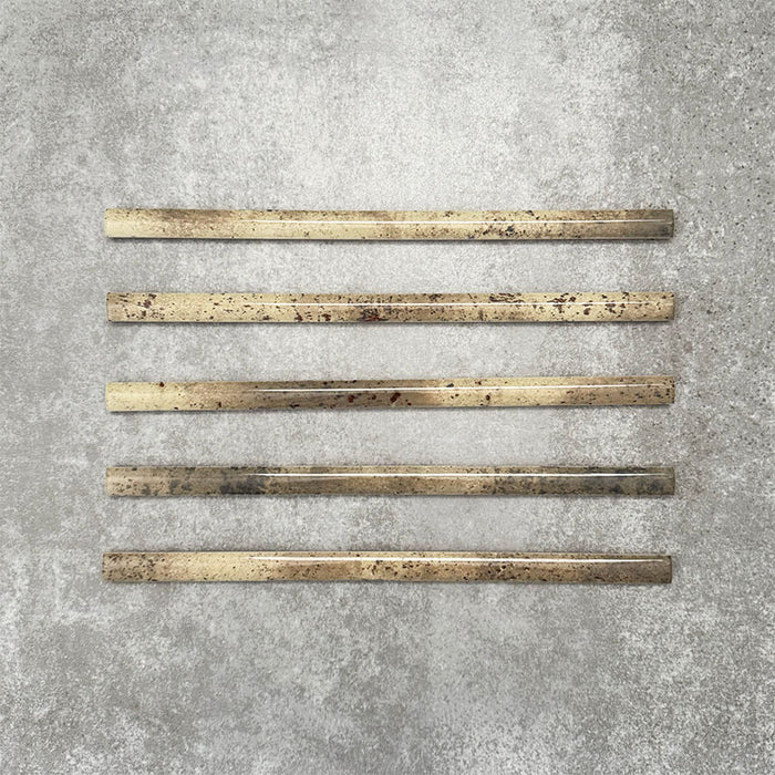 Foundry Moss Green 1.5x30cm gloss pencil bullnose border tile featuring a handcrafted-style finish with earthy olive and stone-toned variation, designed for decorative edging and refined finishing details in wall tile installations.