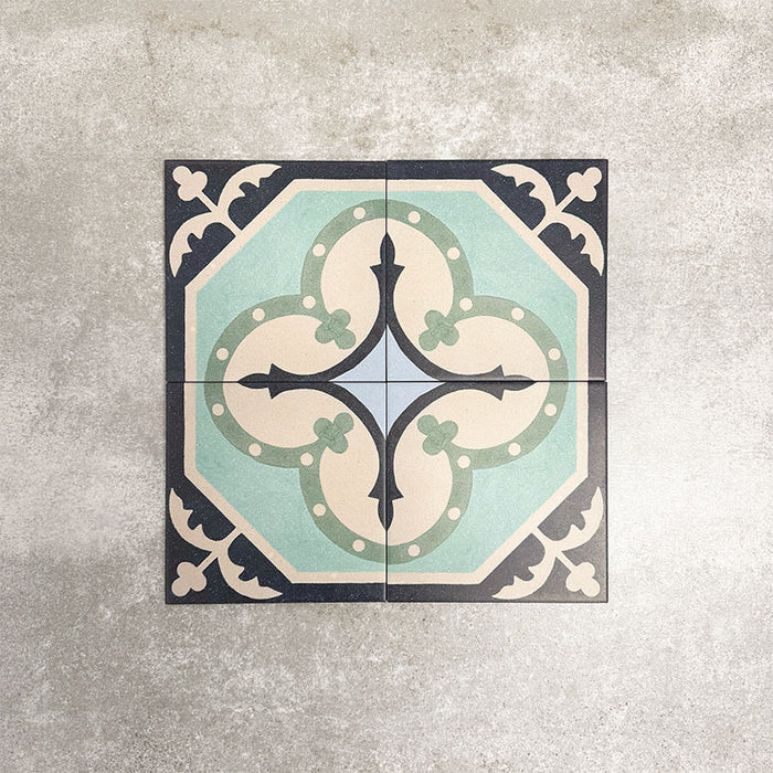 Four London Streets Goodwin Court 20x20cm Victorian Moroccan style porcelain tiles arranged together to showcase the repeating soft blue, cream and charcoal geometric pattern inspired by traditional Victorian style decorative floor tiles.